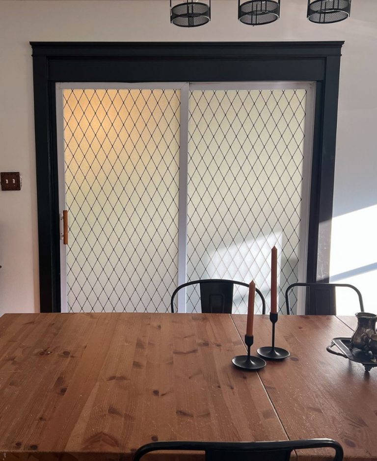 frosted black lattice sliding glass door with black trim
